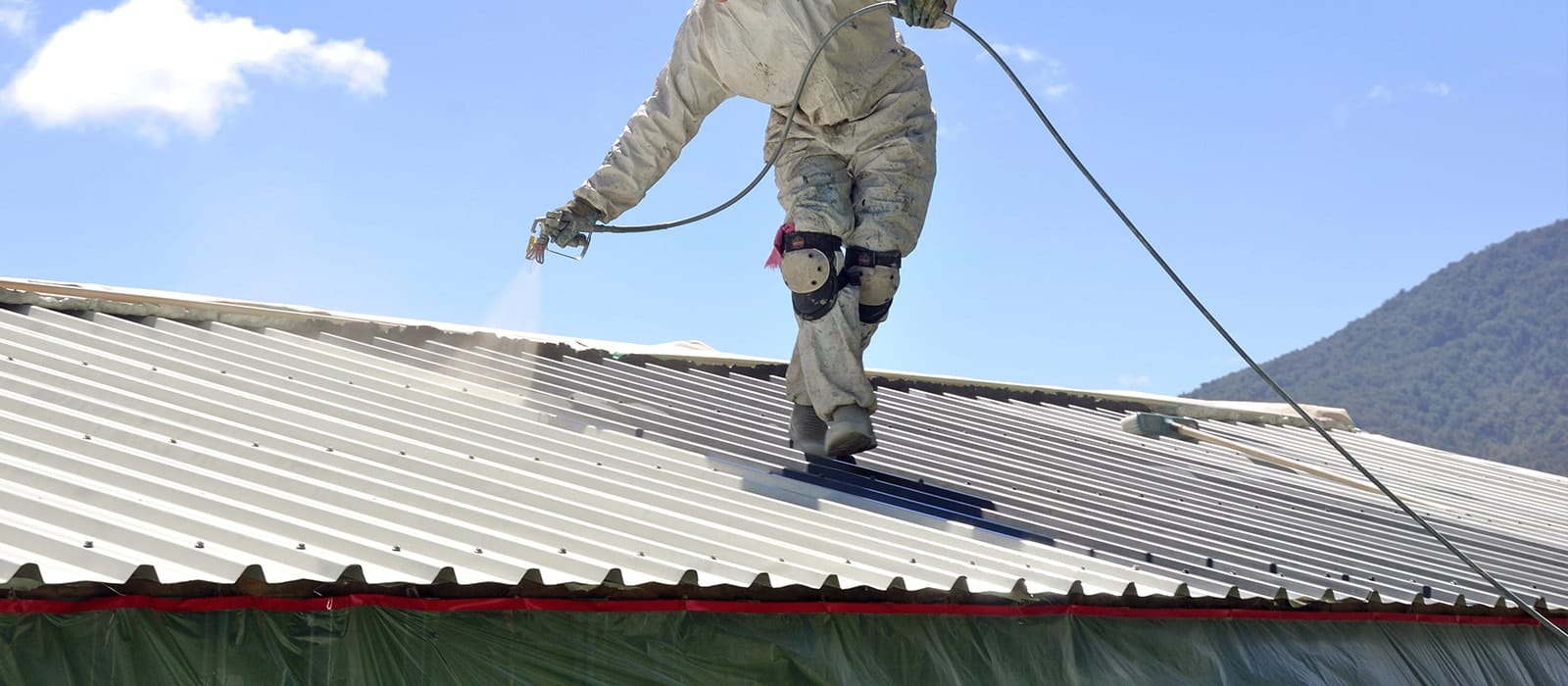 Чем покрасить крышу дома после серебрянки - фото